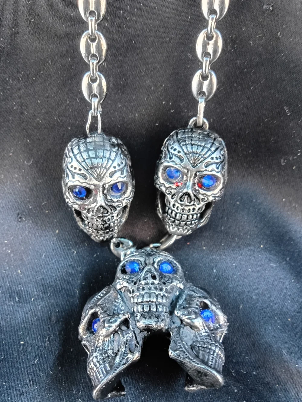 Stainless Steel Men's Skull Necklace with Blue Stone Eyes